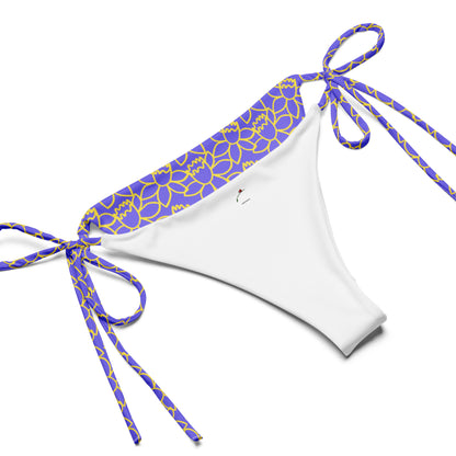 floral print bikini for summer with blue and yellow floral side ties on white fabric