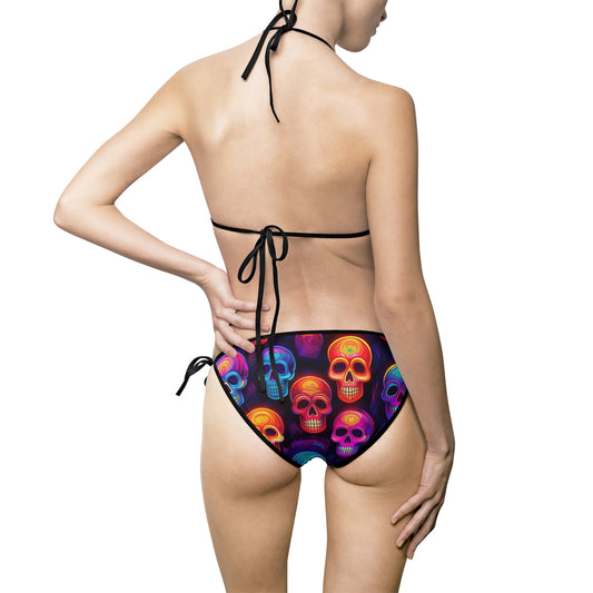 Back view of neon skull bikini swimsuit with colorful skull pattern on black fabric