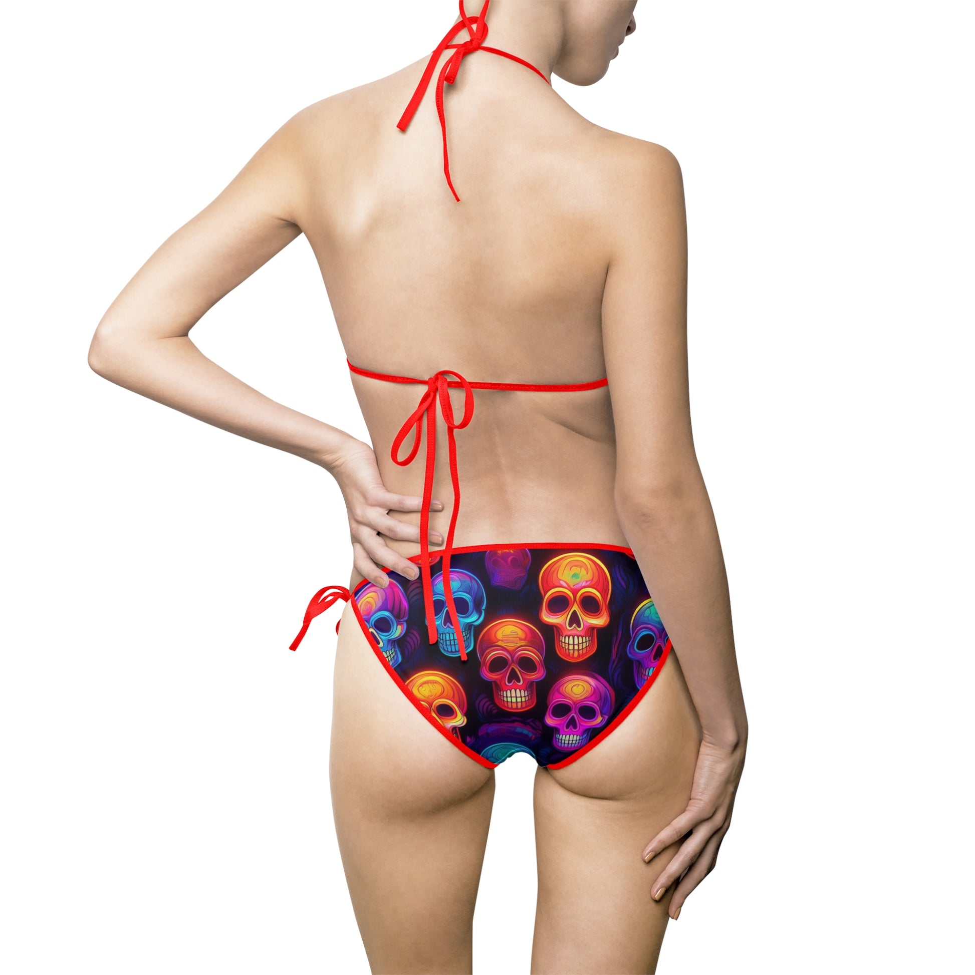 Back view of woman wearing neon skull bikini swimsuit with colorful skull pattern and red ties