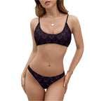 Inkedjoy pink skull bikini swimsuit with black fabric and pink skull pattern two-piece design