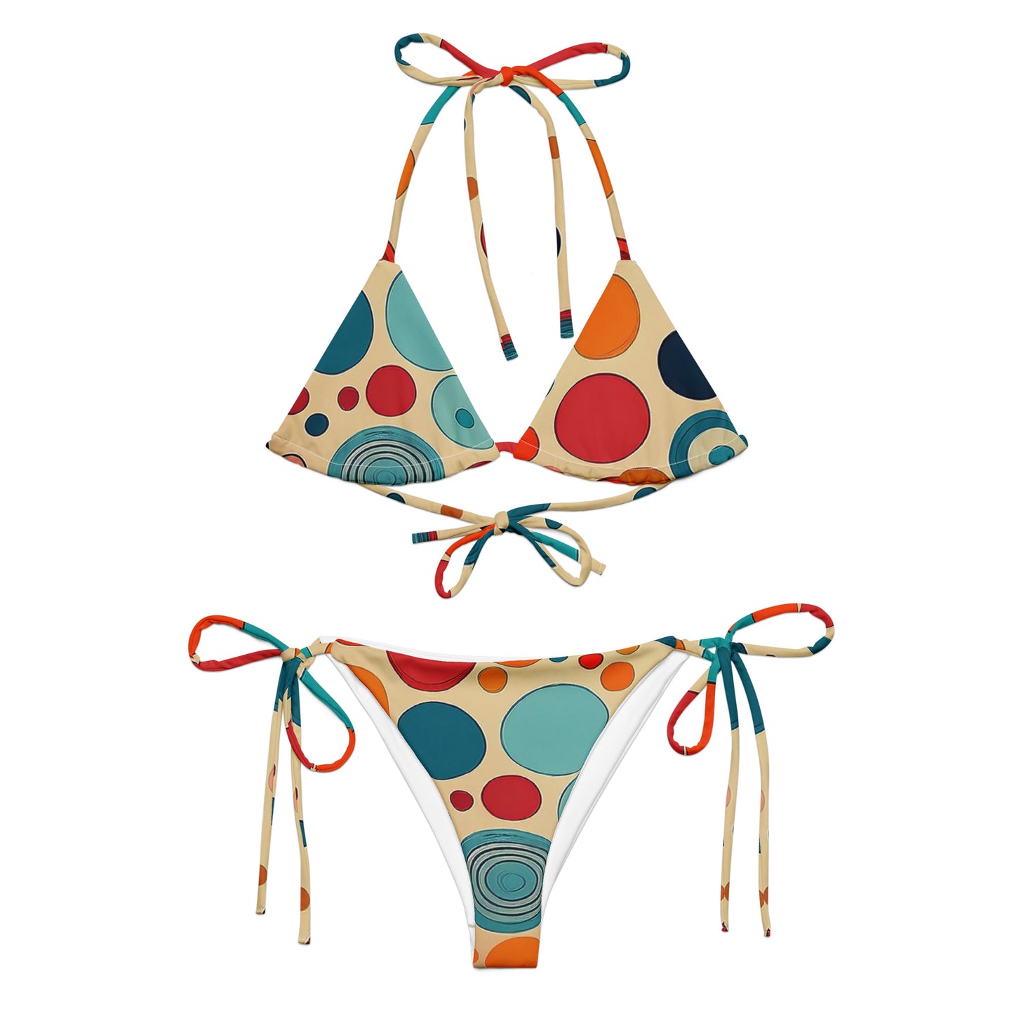 retro polka dot bikini with multicolor large and small circles on beige fabric