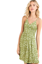 sage green suspender dress with white spots and ruched detail, worn by female model