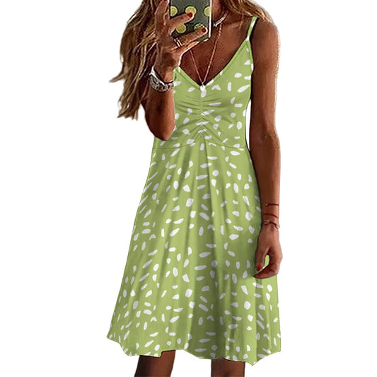 sage green suspender dress with white abstract spots and ruched bust design