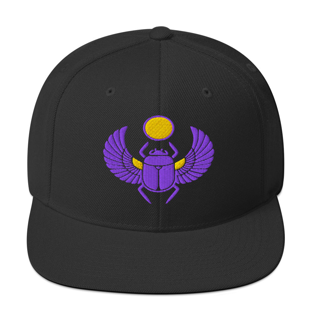 LuckeLadybug black snapback hat with purple and yellow scarab embroidered cap design