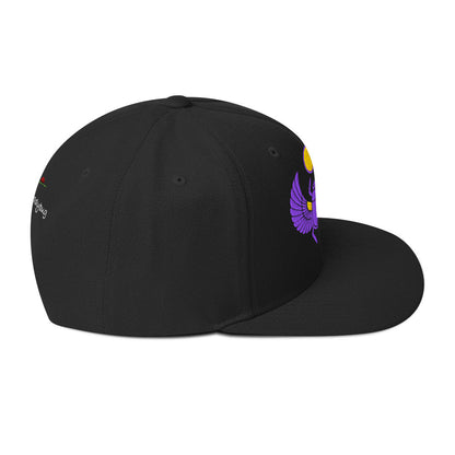Black snapback hat featuring a purple and yellow scarab embroidered cap design by LuckeLadybug