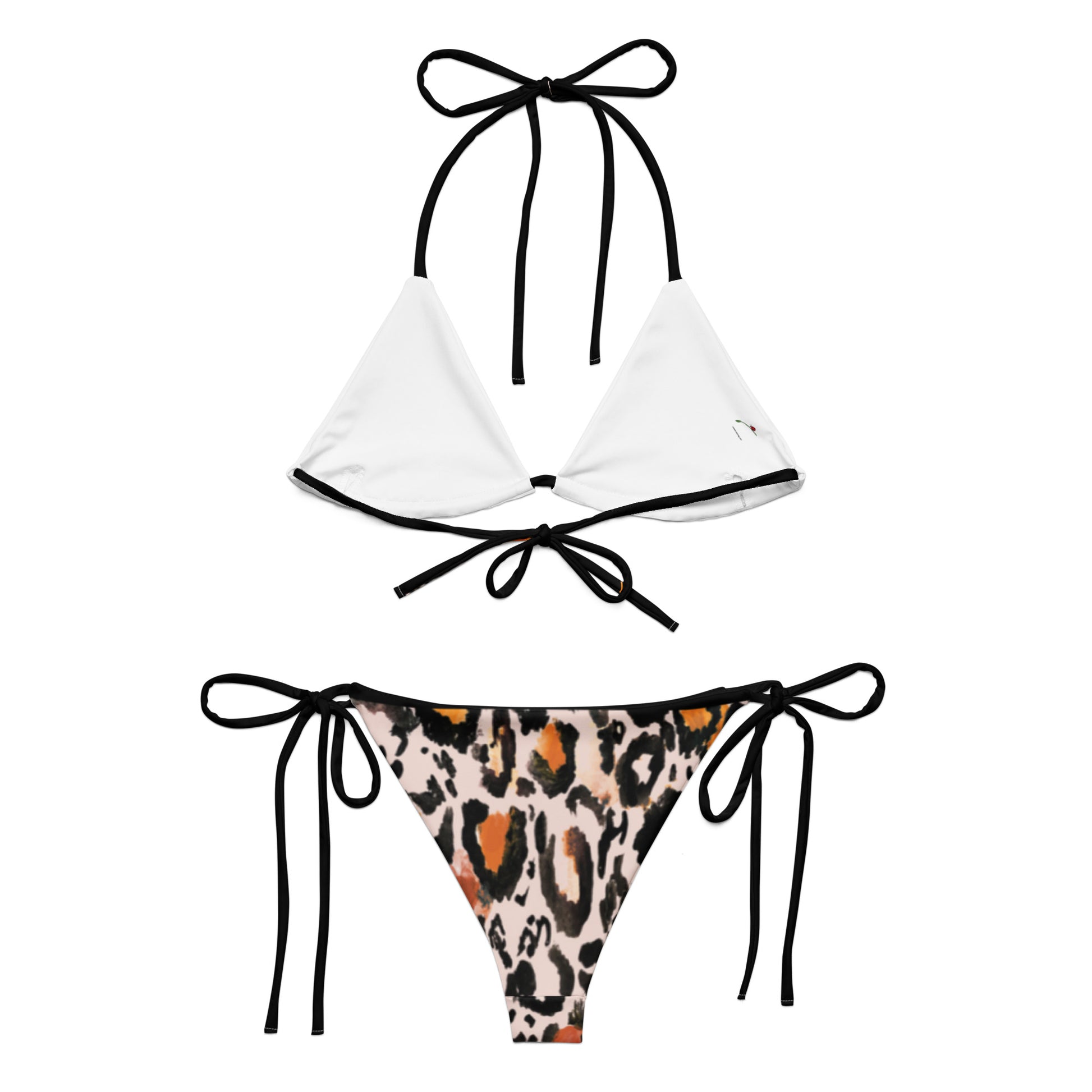 bikini set featuring white top and sexy animal print swimwear bottom with black tie straps