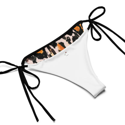 bikini bottom with black ties and sexy animal print swimwear design on the inside