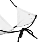 white bikini top with black straps showcasing sexy animal print swimwear style