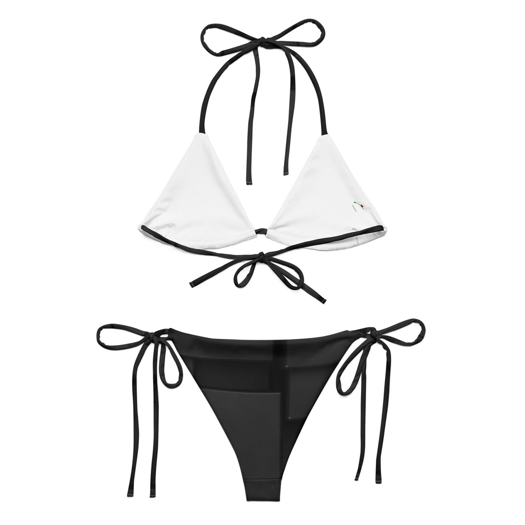 sustainable black string bikini with white triangle top and black tie-side bottoms