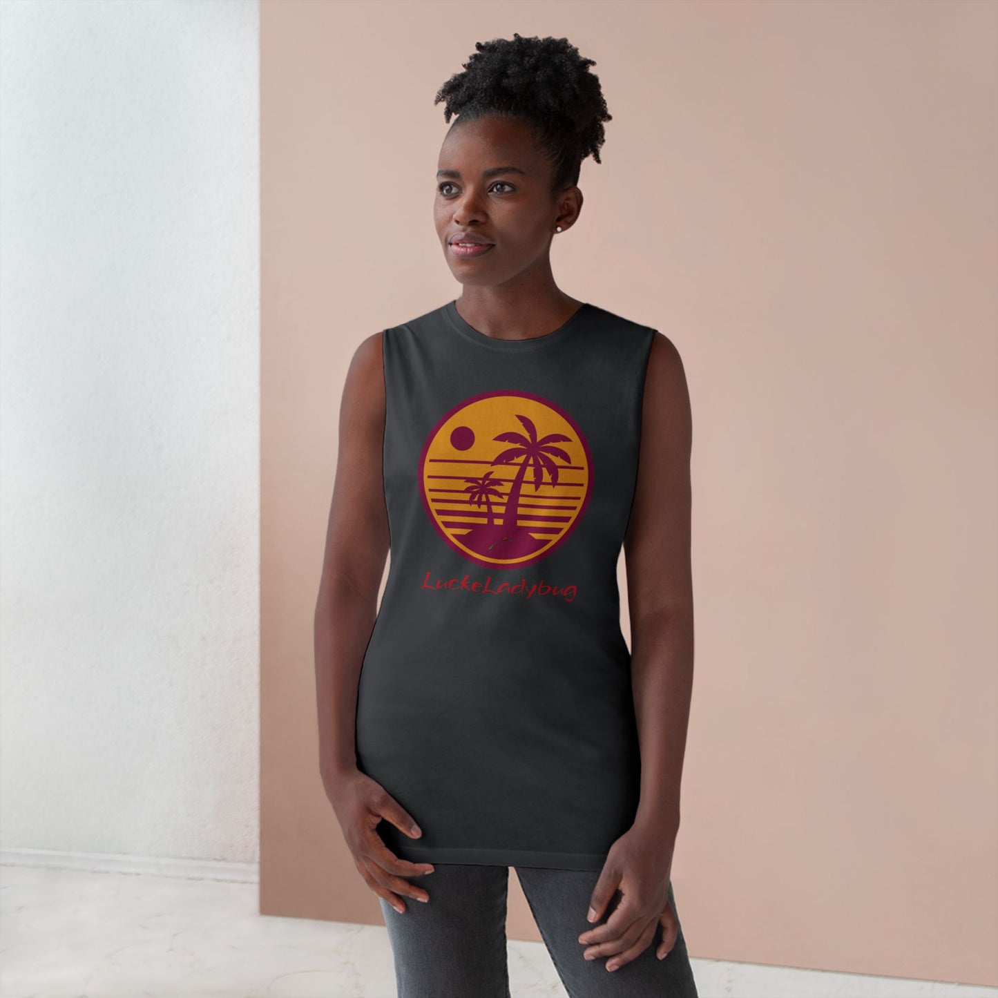 LuckeLadybug trendy palm tree graphic tank in black worn by woman with sunset design