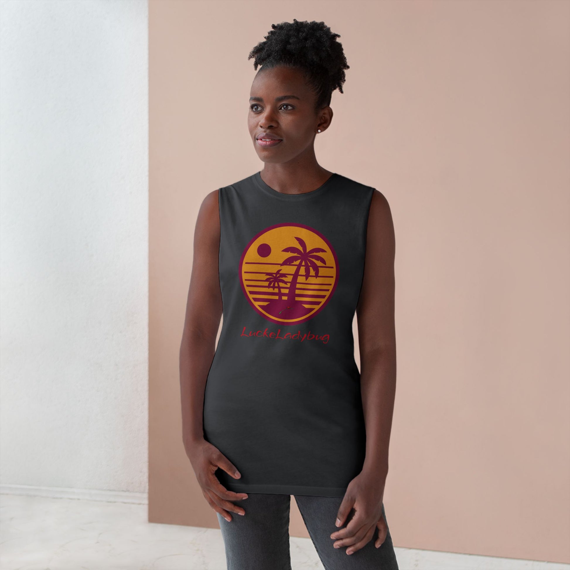 LuckeLadybug trendy palm tree graphic tank in black worn by woman with sunset design