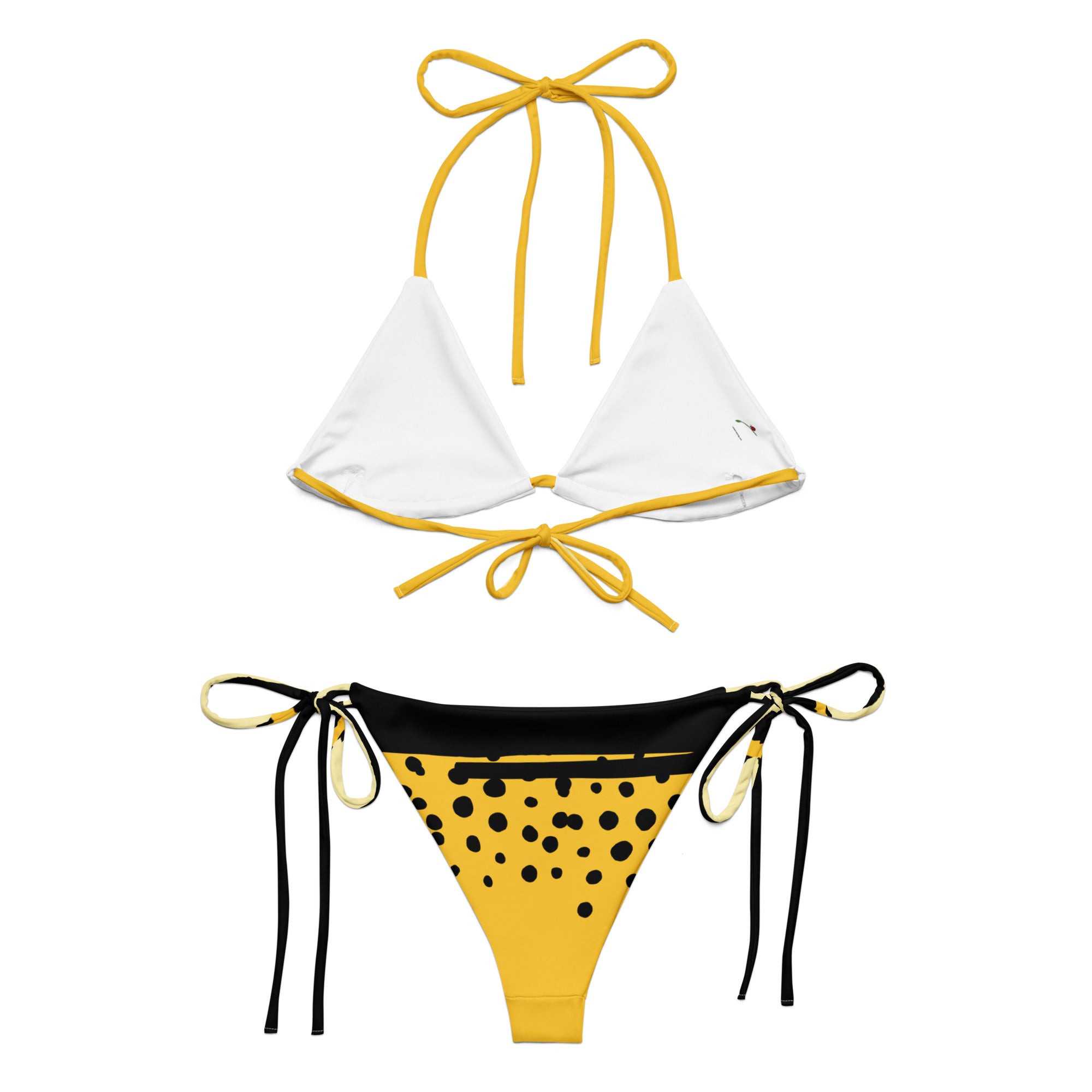 yellow black abstract bikini with white and yellow triangle top and yellow black polka dot tie-side bottoms