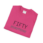 Pink fifty something t shirt with black and gray text folded flat