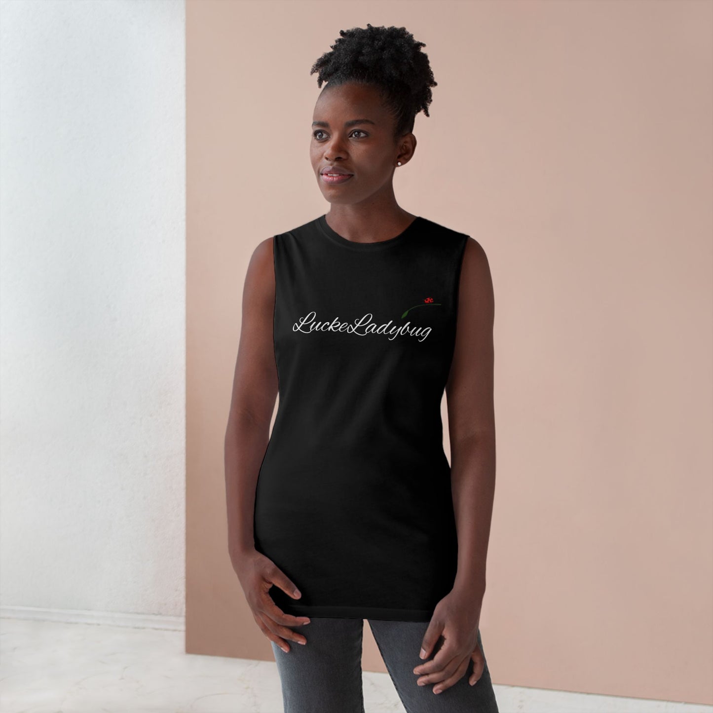 LuckeLadybug black novelty tank top for summer worn by woman with natural hair in casual indoor setting