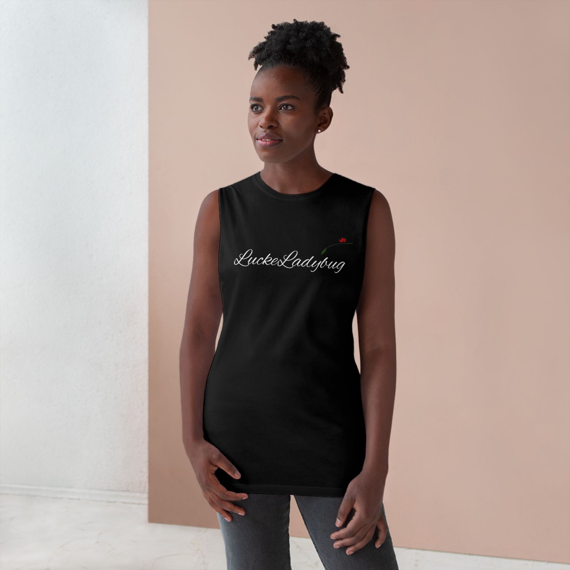LuckeLadybug black novelty tank top for summer worn by woman with natural hair in casual indoor setting