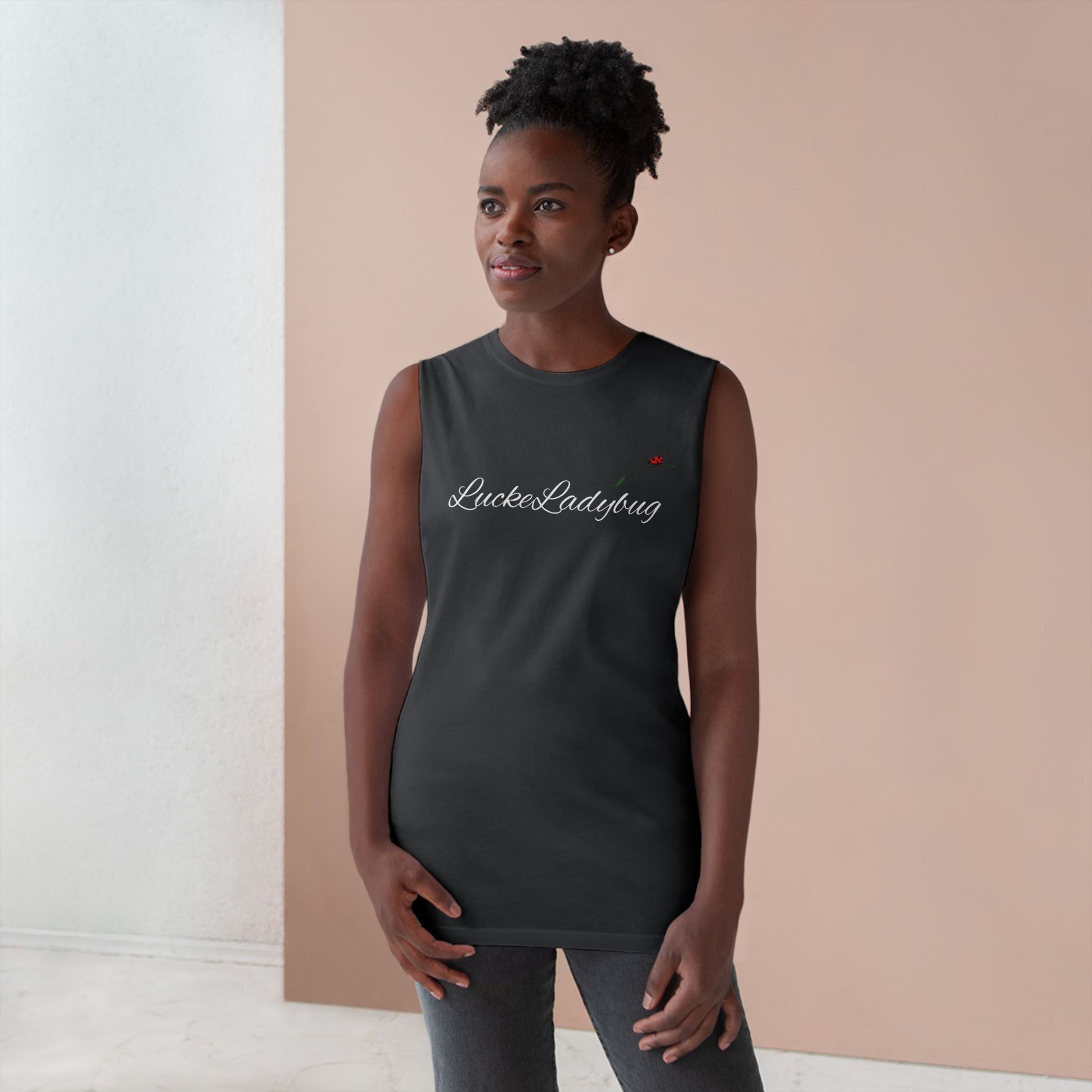 black novelty tank top for summer worn by woman with natural hair in casual setting