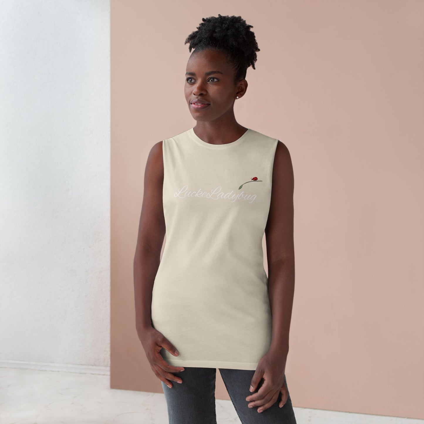 LuckeLadybug beige novelty tank top for summer worn by woman with natural hair