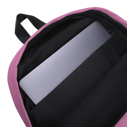 Pink backpack for teens and adults with a padded laptop compartment and black interior lining