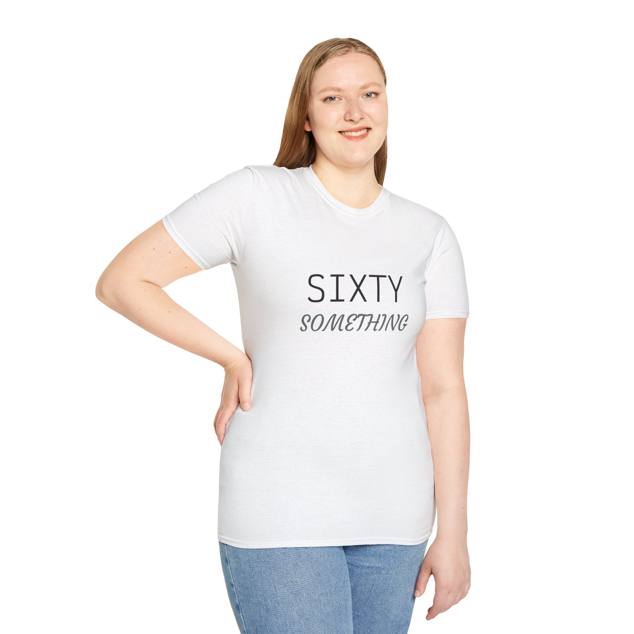 Woman wearing a white sixty something birthday shirt with black text paired with blue jeans