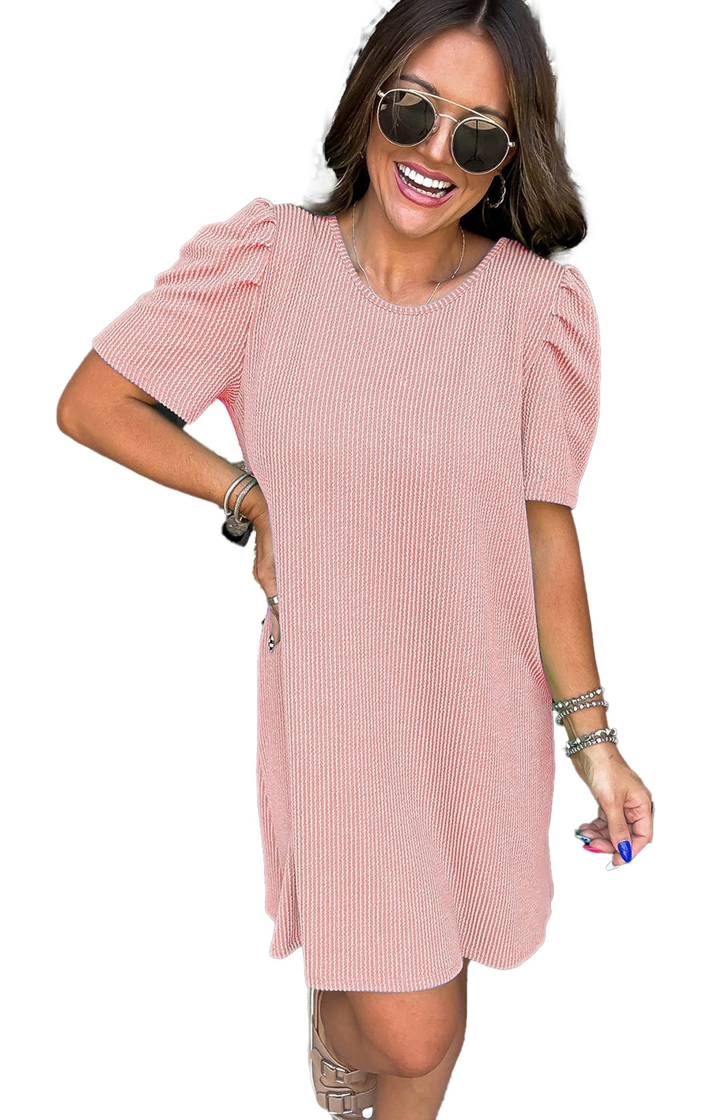 LuckeLadybug H Line parchment knit mini dress worn by smiling woman with sunglasses and bracelets