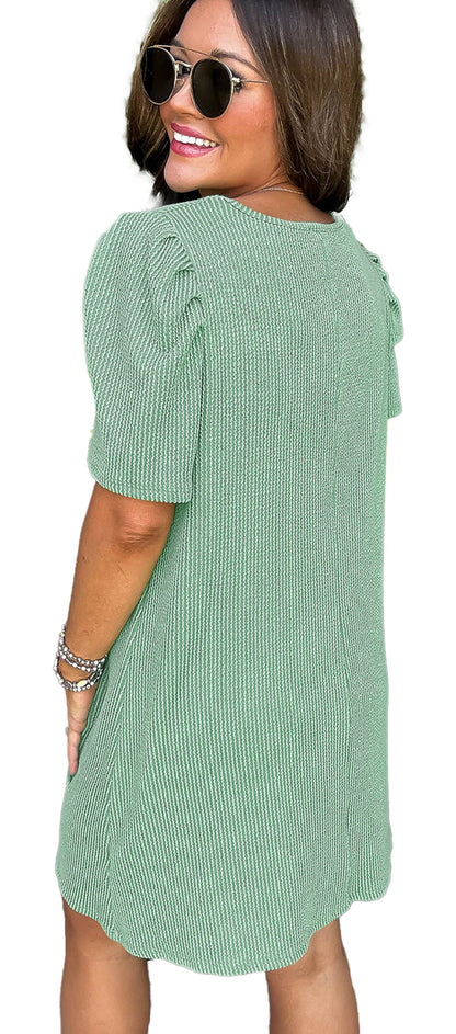 Woman model wearing LuckeLadybug parchment knit mini dress in sage green H Line ribbed knit with puff sleeves