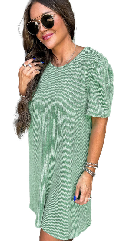 LuckeLadybug parchment knit mini dress sage green H line silhouette with puff sleeves on model