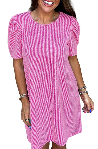LuckeLadybug H Line parchment knit mini dress pink textured knit with puff sleeves on model