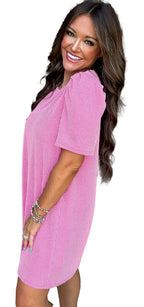 LuckeLadybug model wearing parchment knit mini dress in pink H Line silhouette short sleeves relaxed fit
