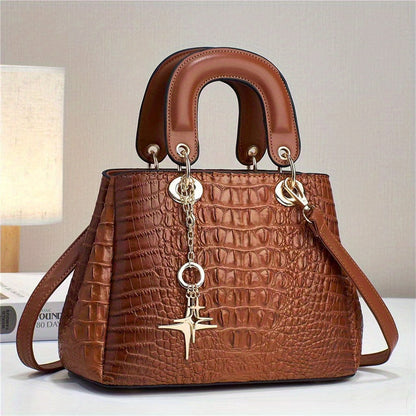 LuckeLadybug LLC luxury crocodile print handbag in rich brown with stylish handles and keychain detail
