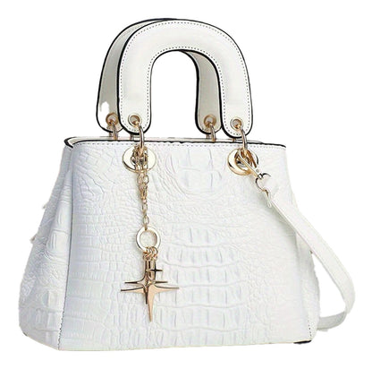 White luxury crocodile print handbag with gold accents and stylish double handles