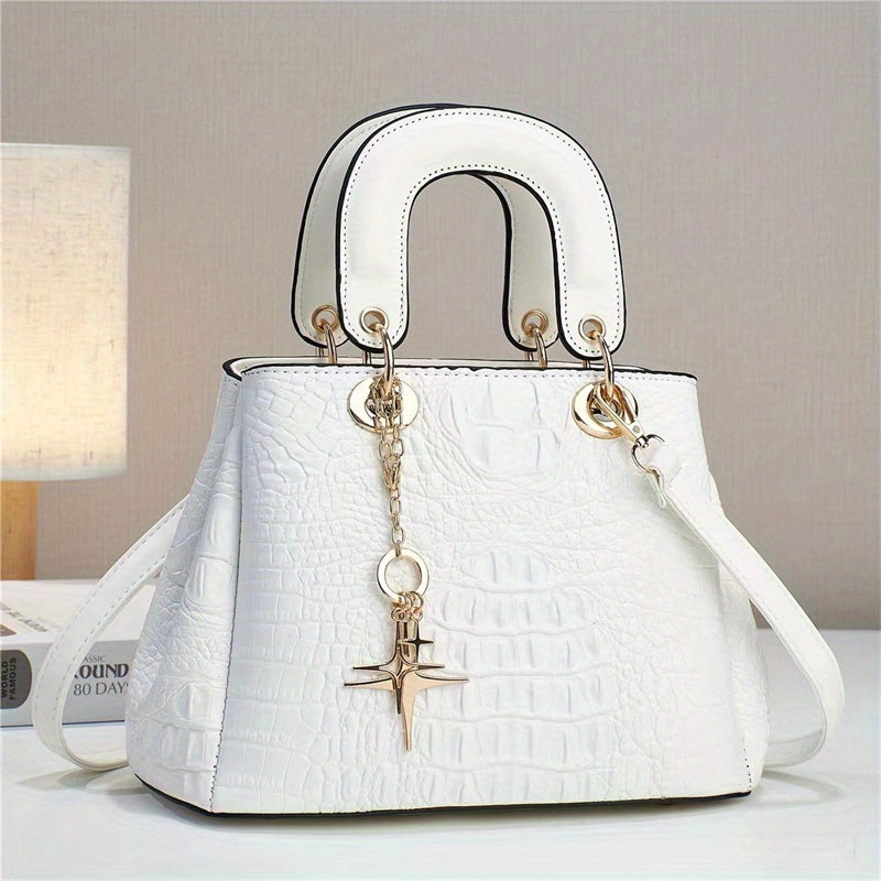 White satchel handbag with luxury crocodile print design and gold accents for a chic look