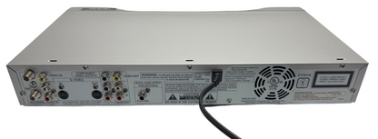 Rear view of a Magnavox DVD recorder showcasing connection ports and power cable.