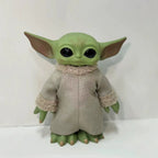 Mandalorian action figure featuring a cute character with large ears and a soft robe, perfect for collectors