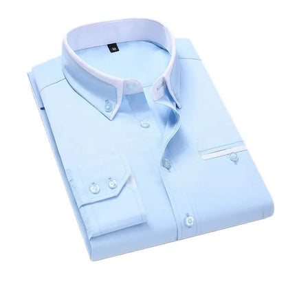 Light blue mens slim fit no-iron dress shirt folded neatly with button details