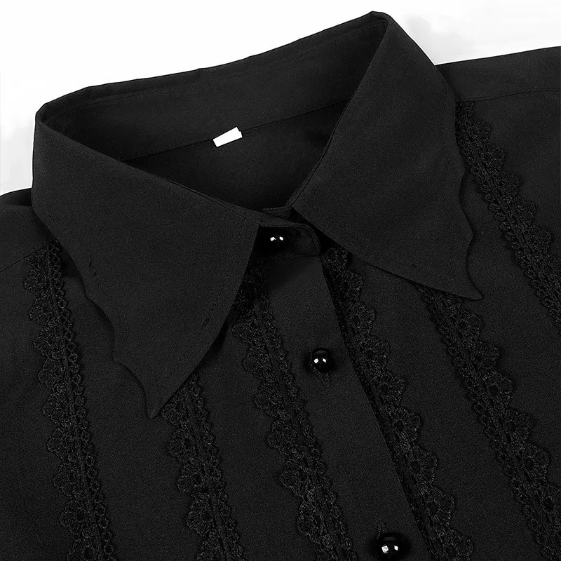 Close-up of a black men's gothic ruffled dress shirt with elegant lace detailing and buttons