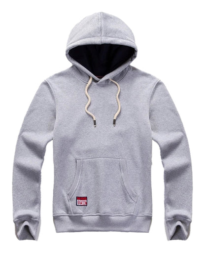 Men's oversized hoodie in light gray with front pocket and drawstrings for a comfortable fit