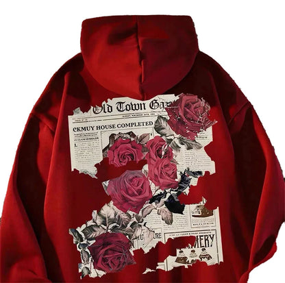 Men's rose print hoodie in red featuring floral graphics and vintage newspaper design on the back