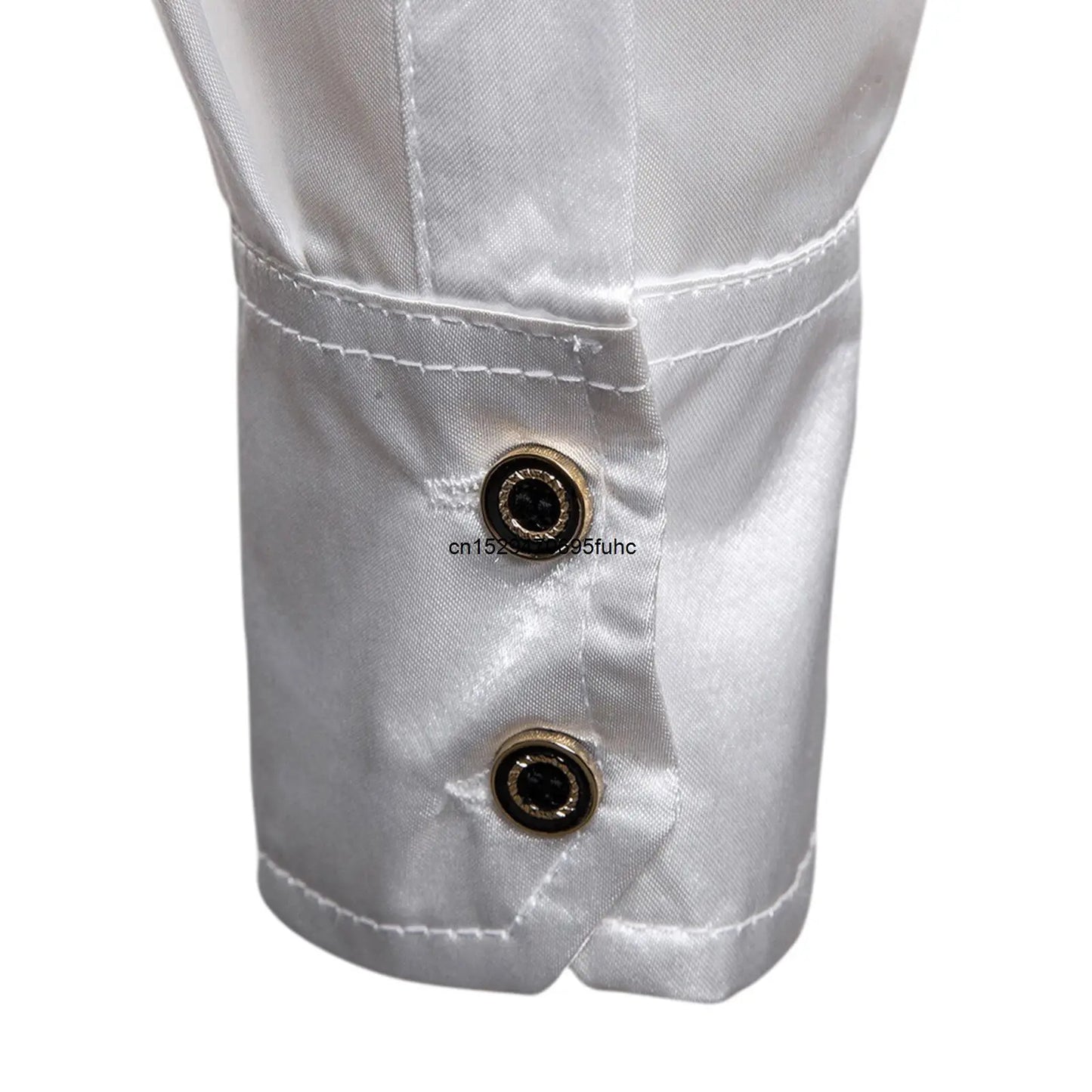 Close-up of men's sequined performance shirt cuff featuring stylish buttons for a polished look