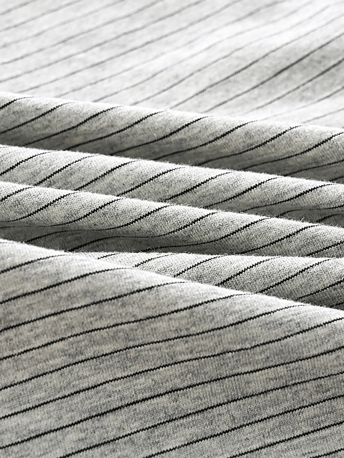 Close-up of men's striped boxer briefs 4 pack showcasing soft fabric with thin stripes