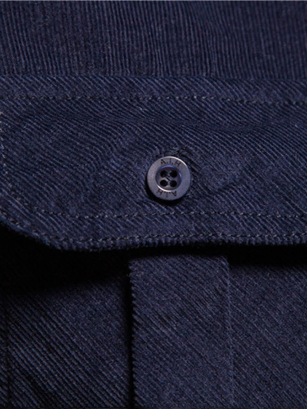 Close-up of a Navy Button Up from LuckeLadybug LLC, featuring details suitable for mens t shirt graphics