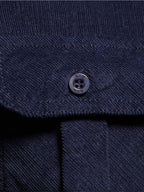 Close-up of a Navy Button Up from LuckeLadybug LLC, featuring details suitable for mens t shirt graphics