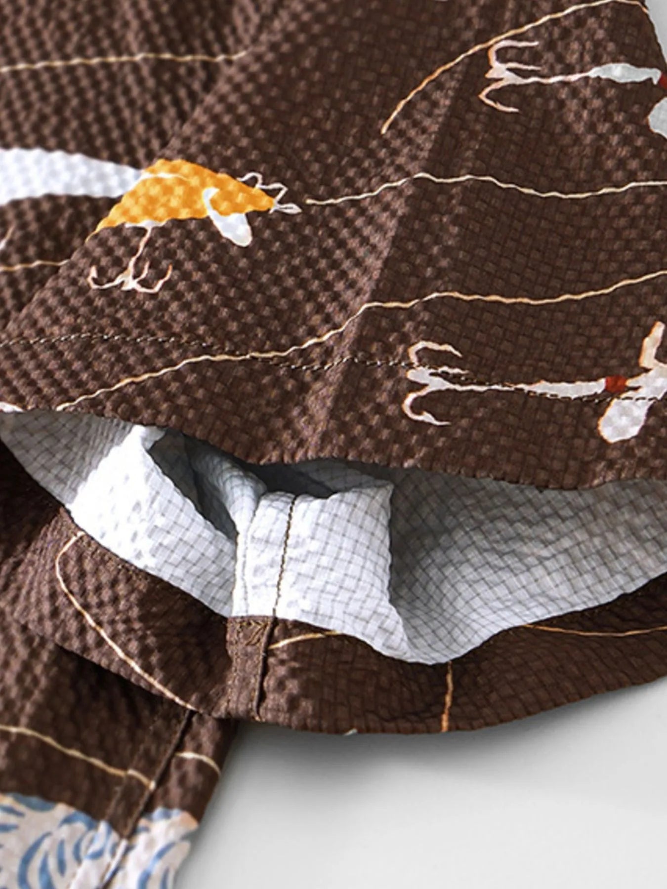 Close-up of LuckeLadybug LLC mens t shirt graphics featuring a unique brown pattern