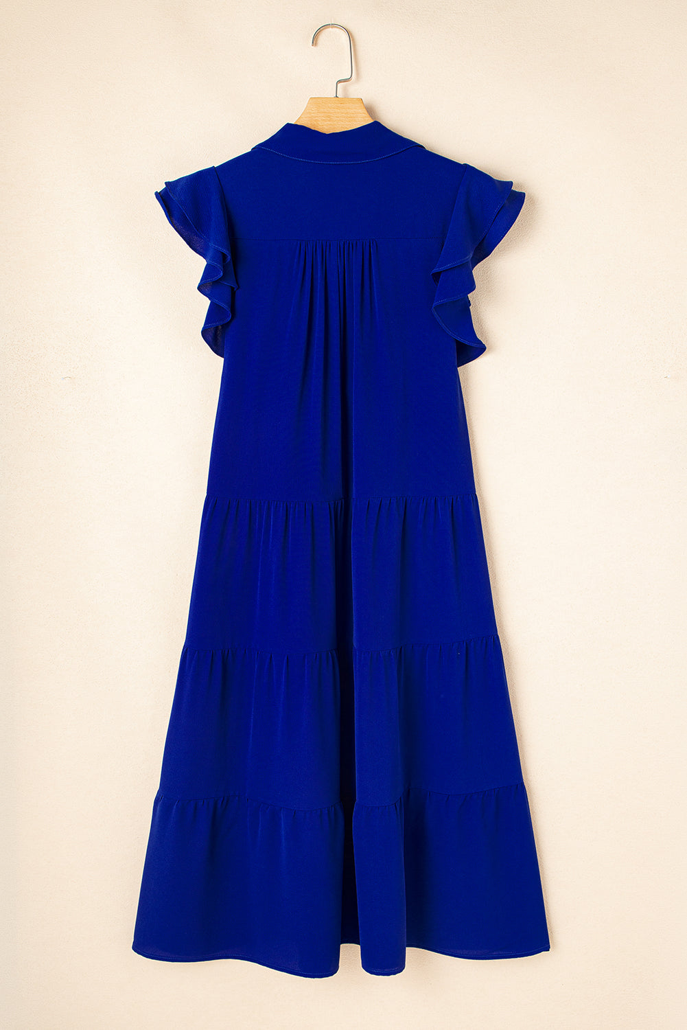 Blue LuckeLadybug LLC midi dress with ruffle sleeves and tiered design for a stylish look