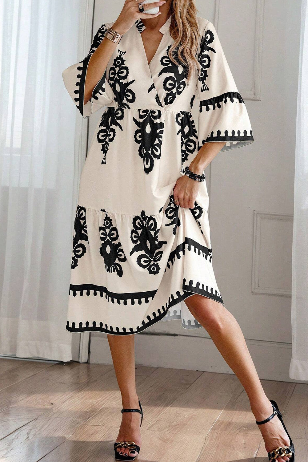 LuckeLadybug LLC Fit & Flare Midi Dress in Cream with Black Floral Embroidery and Short Sleeves