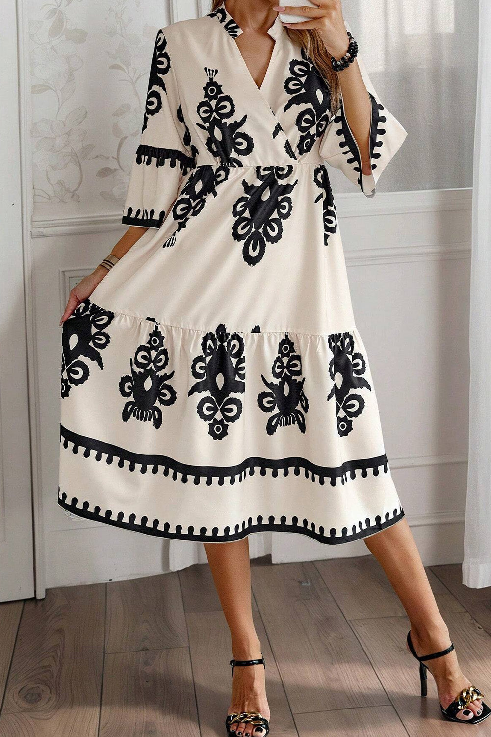 LuckeLadybug LLC Fit & Flare Midi Dress in Cream with Black Floral Patterns