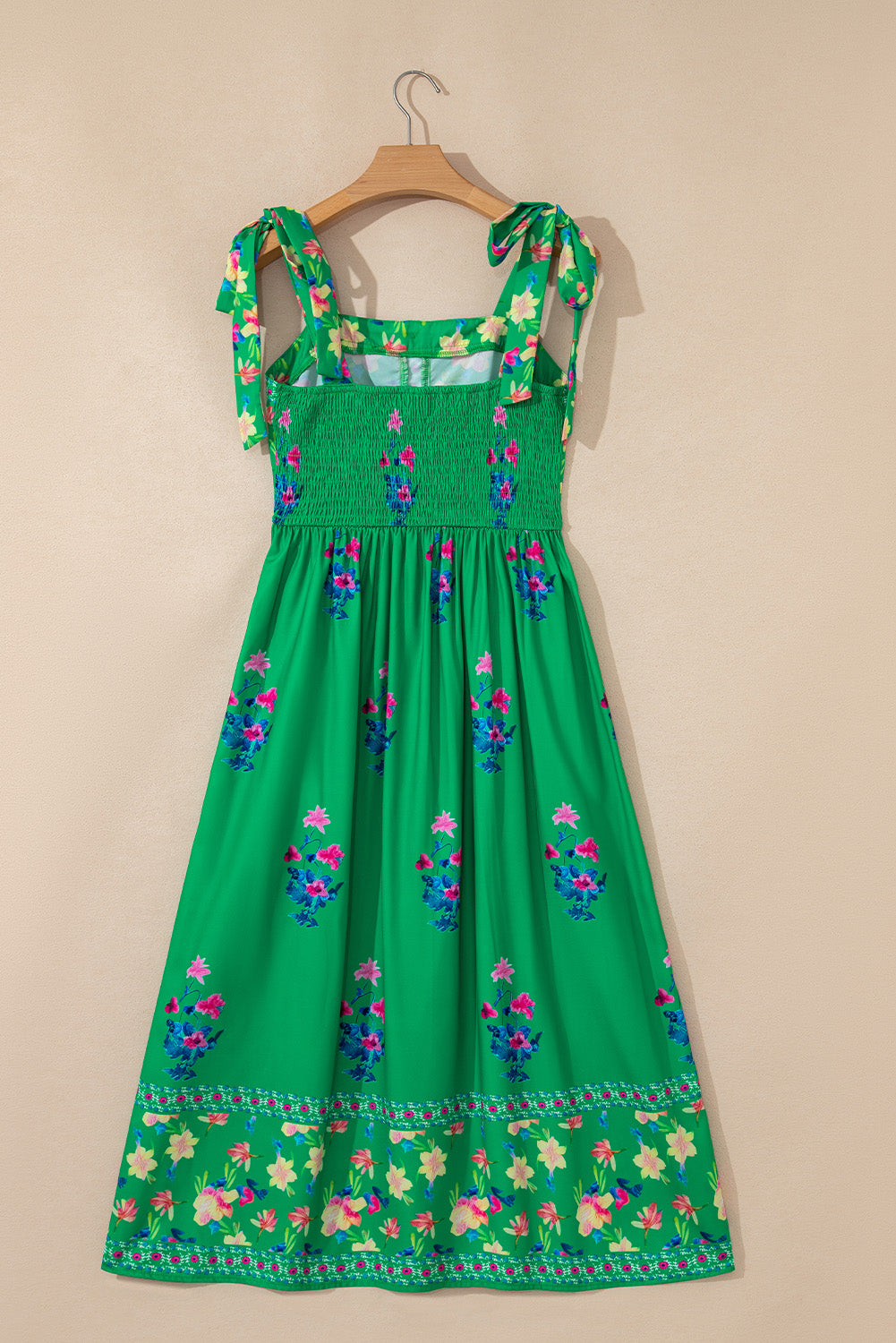 Bright green midi dress from LuckeLadybug LLC with floral patterns and tie straps