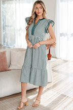 Fit and flare midi dress with ruffled sleeves and striped pattern, perfect for casual outings