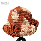 Crochet adult hat with ruffle detail in warm tones for mommy and me apparel