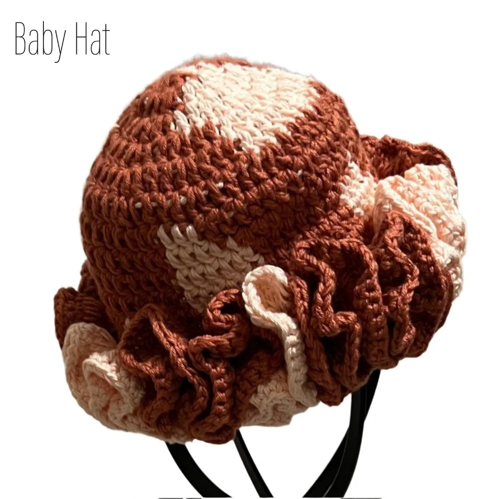 Crocheted baby hat with ruffles in brown and cream, perfect for mommy and me apparel