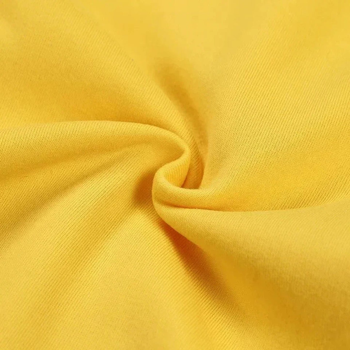 Close-up of soft yellow fabric texture for moon print hoodie for women
